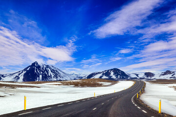 Iceland Ring Road in North Iceland, with snow and snowy mountains.