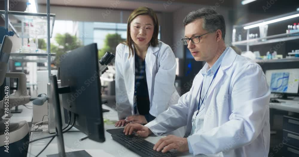 Poster female research scientist having a conversation with an bioengineer about the effects of different p