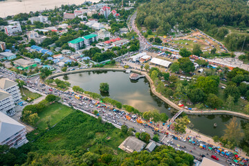 Aerial view of the parade in traditional buddhist festival "Chak Pra" (Traditional Lak Phra), Songkhla, Thailand.