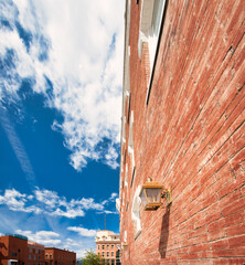 This side angle view of a solid red brick wall in Colorado reflects the sturdy nature of heart land...