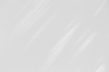 Obraz premium Blank white cement wall background, morning light shade on blank white wall background