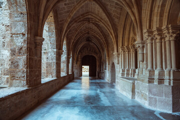 Serene Stone Archways of an Ancient Monastery Corridor