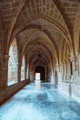 Serene Stone Archways of an Ancient Monastery Corridor