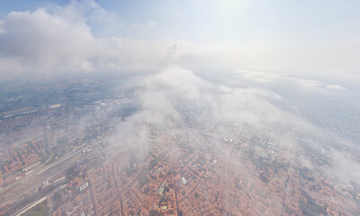 Bologna, Italy. Historical Center. Panorama of the city on a summer day. Flying in the clouds....