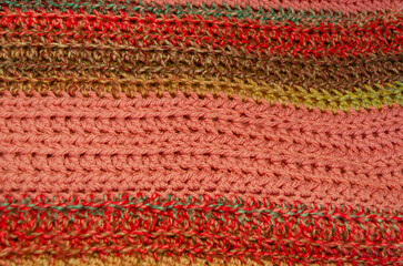 Close-up of a multi-coloured hand knit crocheted blanket