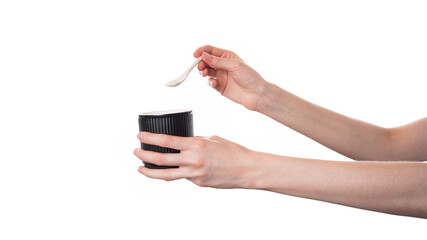 Person Holding Cup With Spoon