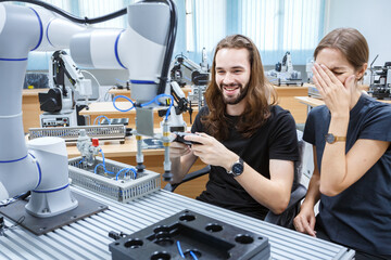 automation machine engineer students study and inspection control robot arm machine in robotics...