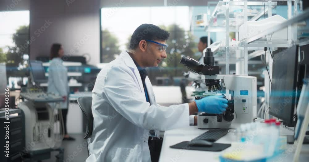 Poster molecular biology research scientist looking at a dna sample under a microscope in an applied scienc