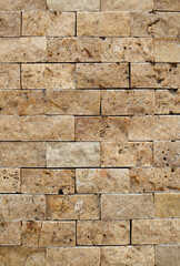 New light brown decorative stone wall closeup