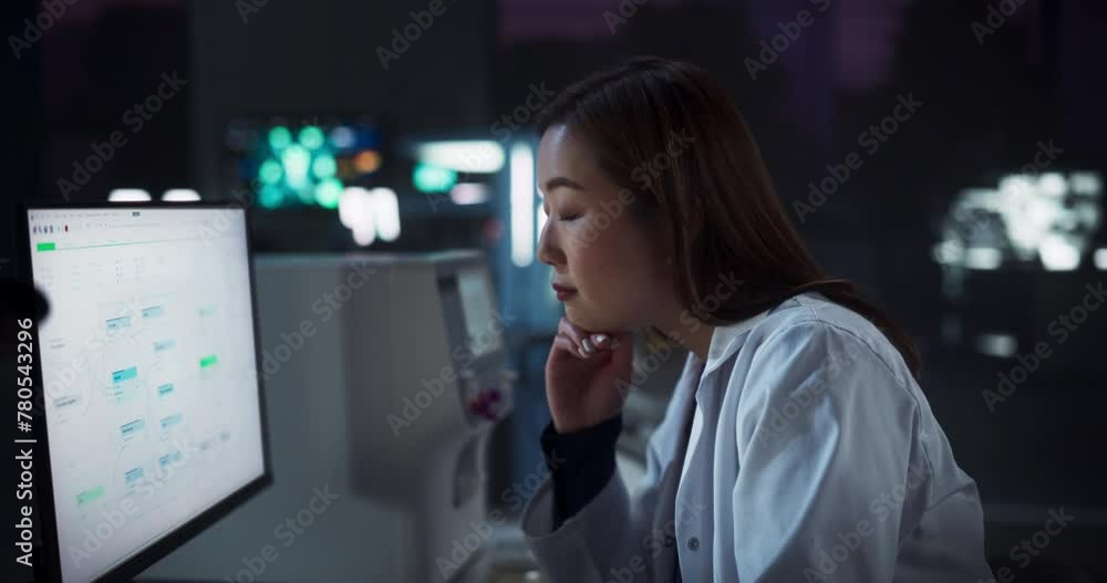 Aufkleber asian female scientist working on a computer in the evening. specialist using a gene sequencing soft