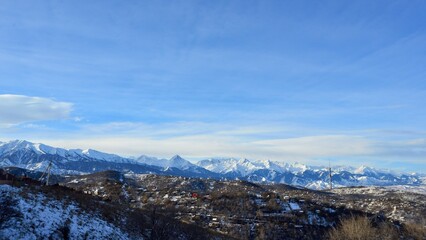 The winter view of the Almaty mountains taken from the surrounding hills