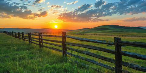 Golden Sunset Over Serene Countryside Landscape with Rustic Fence