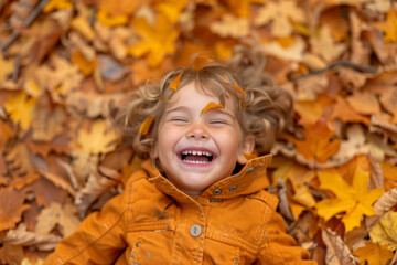 Joyful Child in Autumn Leaves: Candid Laughter and Happiness