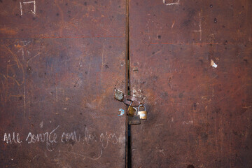 Part of an old rusty iron door