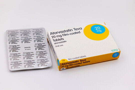 "Atorvastatin" box and tablet blister pack. Medication called statins used to lower cholesterol. Manufactured by "Teva Pharmaceuticals". Dublin, Ireland
