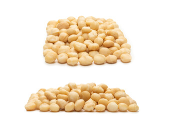 Macadamia nuts isolated on white background.