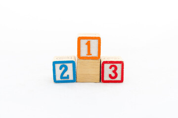 A podium made with wooden blocks with numbers isolated on white background