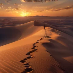 Fotobehang A lonely traveler walks through the endless desert © Oleksandr