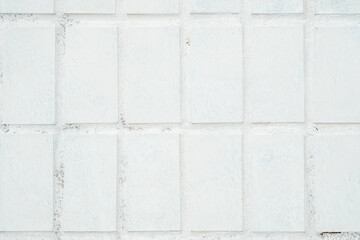 White Tiled Wall With Small Squares