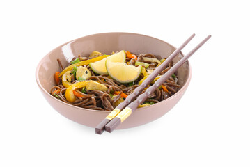 Stir-fry. Delicious cooked noodles with chicken in bowl and chopsticks isolated on white