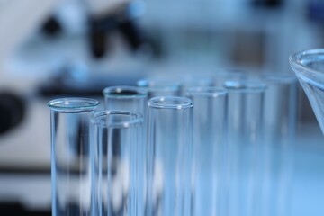 Laboratory analysis. Glass test tubes on table indoors, closeup