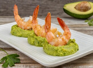 Shrimps with guacamole. Mexican food.