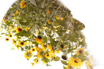 A double exposure profile of a man merged with yellow flowers photo - 780592009