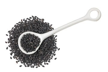 black sesame seeds in ceramic spoon isolated on white background. Top view. Flat lay