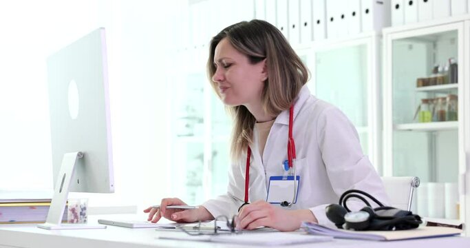 Doctor ignoring clinical recommendations on internet and writing documents 4k movie. Selfconfidence of medical personnel concept