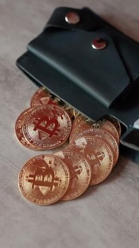 Wallet with credit cards and bitcoin digital asset gold coins BTC. Digital crypto coin and cryptocurrency. Concept of exchange market and online trading. Trading in bull and bear markets