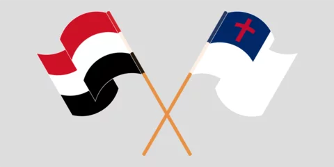Foto op Plexiglas Crossed and waving flags of Yemen and christianity © valyalkin