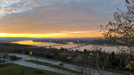 sunset over the Danube river and city of Novi Sad in Serbia - obrazy, fototapety, plakaty