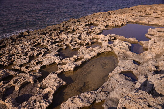 Rocky coast in Bugibba, Malta, Mediterranean
