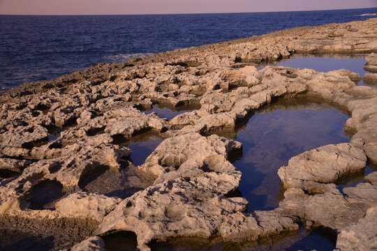 Rocky coast in Bugibba, Malta, Mediterranean