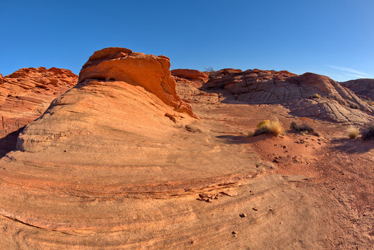 The swirls and blocky texture of fossilized sand dunes in the badlands of Horseshoe Bend, Arizona, United States of America