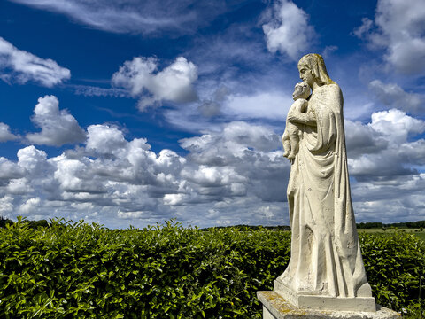 Virgin and Child statue, in a Normandy landscape, Eure, Normandy, France