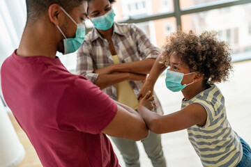 Family is wearing facemasks during coronavirus and flu outbreak. Virus and illness protection, COVID - 780629055