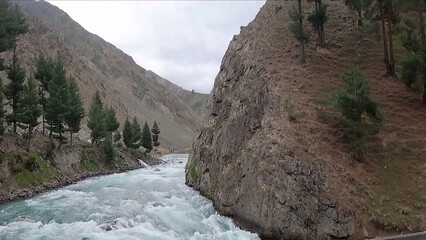 river in the mountains River Flowing Water Mountain Road Bend Cobblestone Grass Natural Plants...