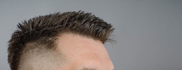 Close-Up of Man's Short Spiked Haircut
