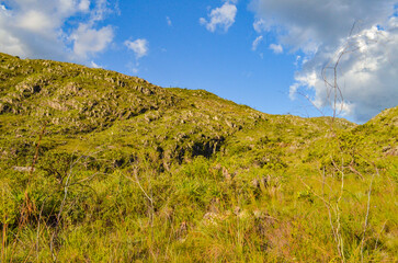 Sunset in the Serra do Cipó mountains in Brazil. Coloring the high altitude fields yellow.