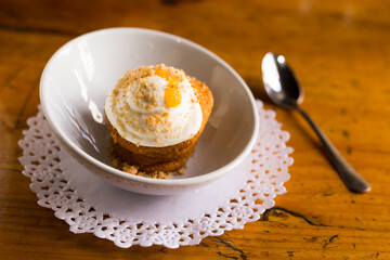 Delicious dessert - carrot cake with orange crumbs clos eup