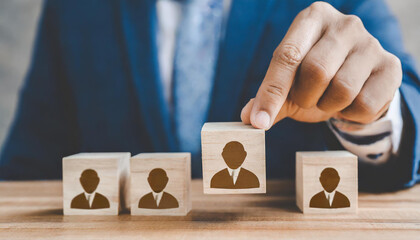 Select leader or employees, Headhunting, Recruitment business and Human Resource Management with wooden cubes