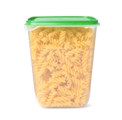 Tuinposter Plastic container filled with pasta isolated on white © New Africa
