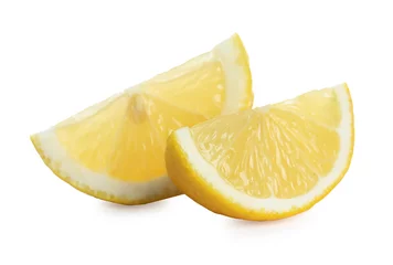 Deurstickers Pieces of fresh lemon isolated on white © New Africa