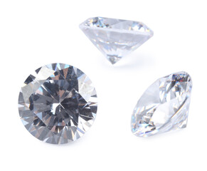 Different beautiful shiny diamonds isolated on white