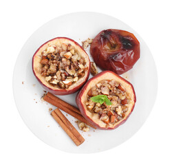 Tasty baked apples with nuts, honey, cinnamon sticks, top view