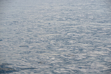 texture of blue river water with small waves