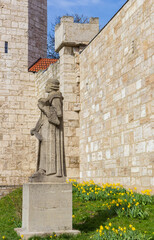 Statue of Thomas Muntzer at the city walls in Muhlhausen, Germany