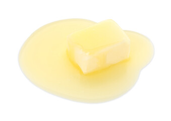 Piece of melting butter isolated on white