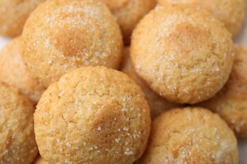 Tasty sweet sugar cookies as background, closeup
